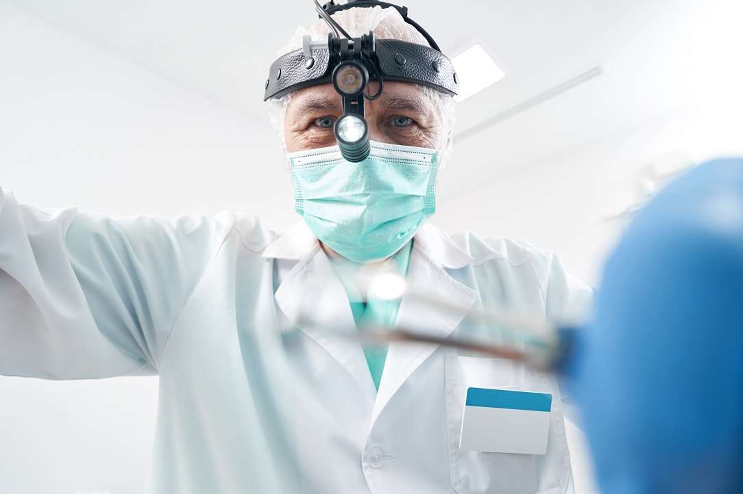 Close-up photo of otorhinolaryngologist at work process