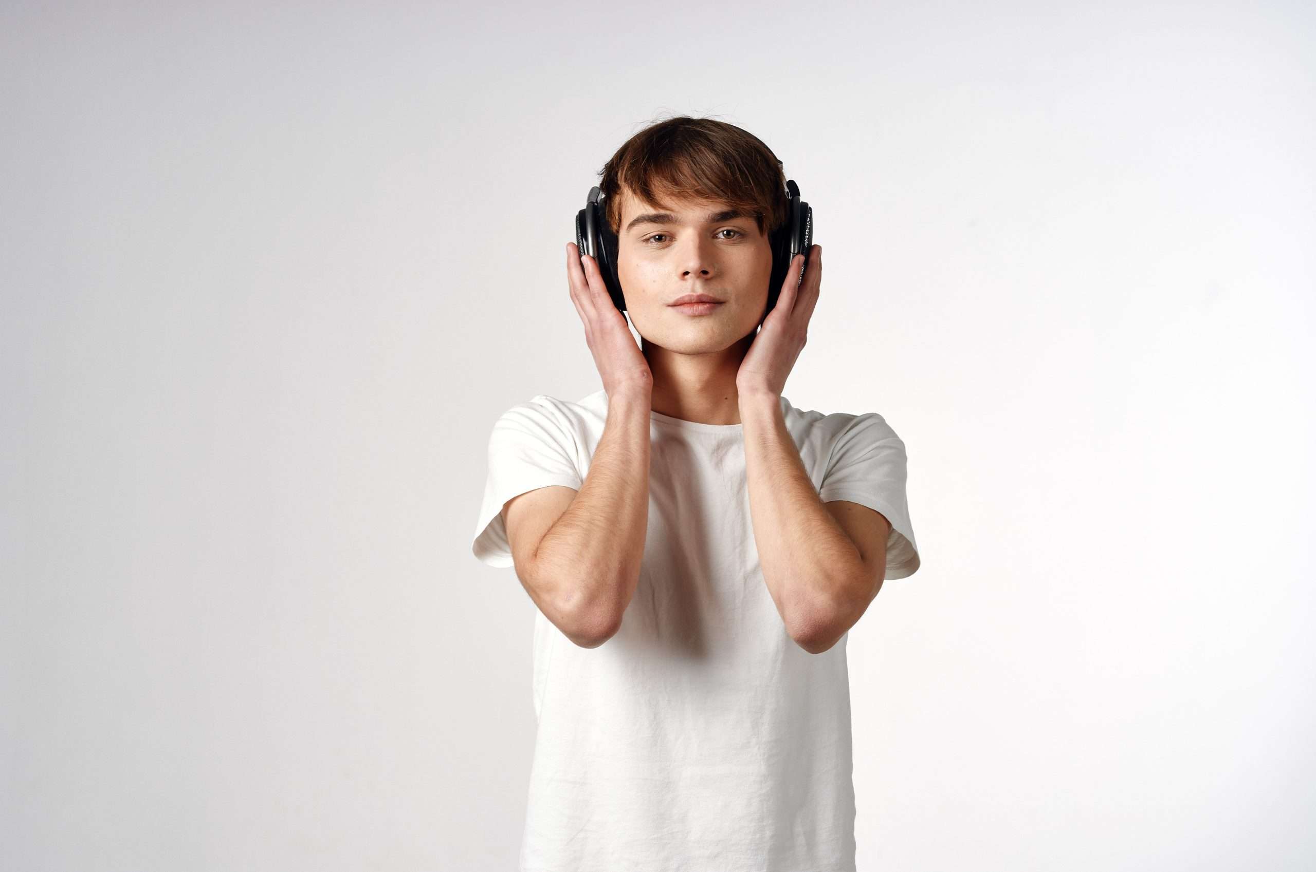 Guy in headphones listen to music entertainment technology